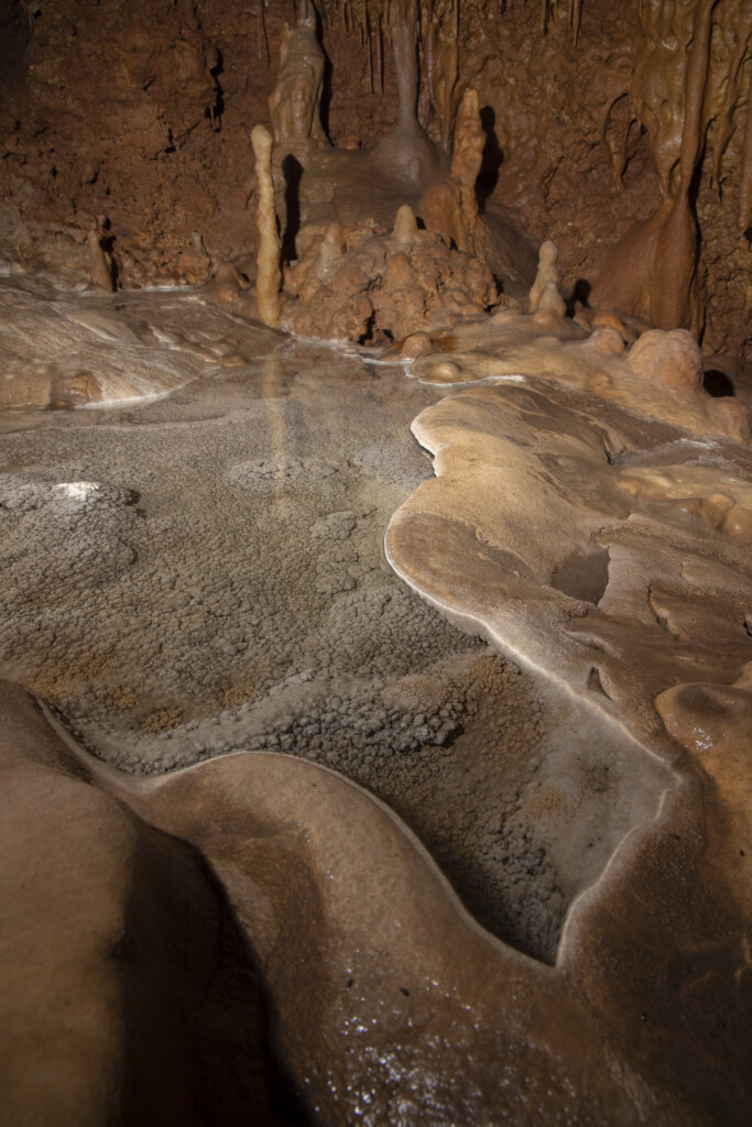 Flowstone and pools at the end of the northern formation passage.